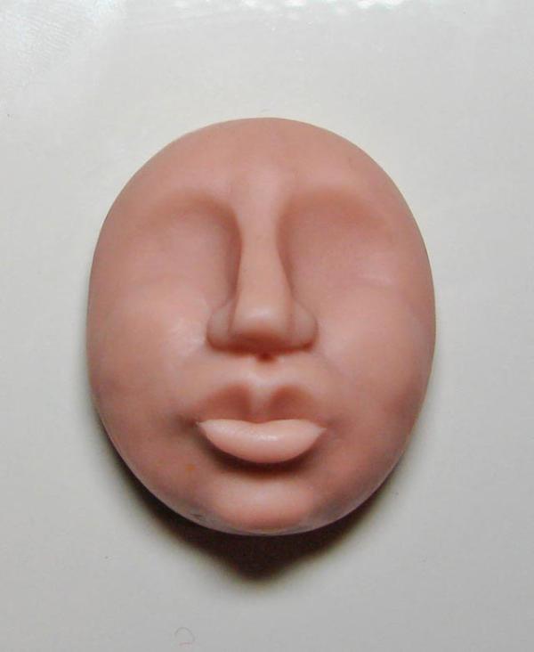 Cómo moldear una cara con arcilla - Paso 11
