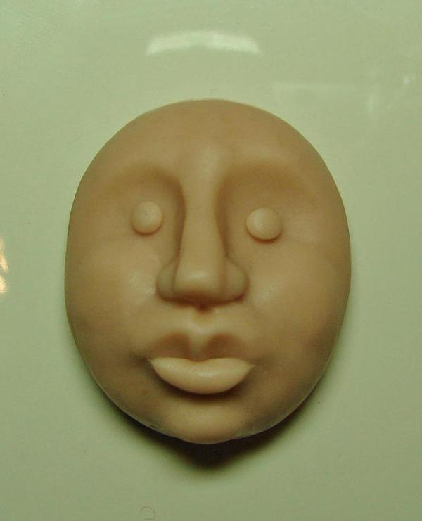 Cómo moldear una cara con arcilla - Paso 12