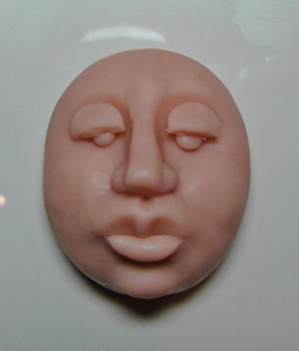Cómo moldear una cara con arcilla - Paso 14
