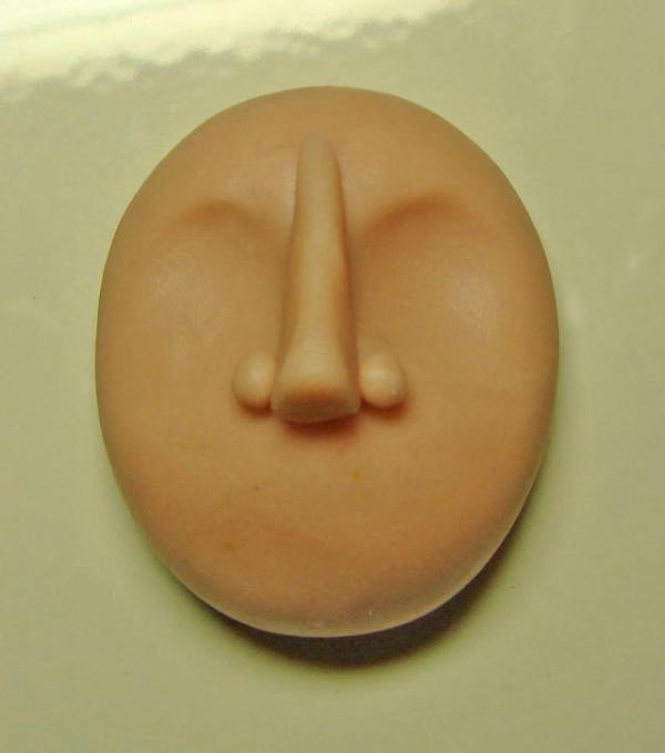 Cómo moldear una cara con arcilla - Paso 3