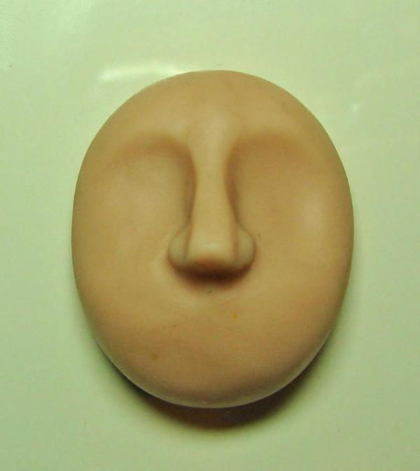 Cómo moldear una cara con arcilla - Paso 4