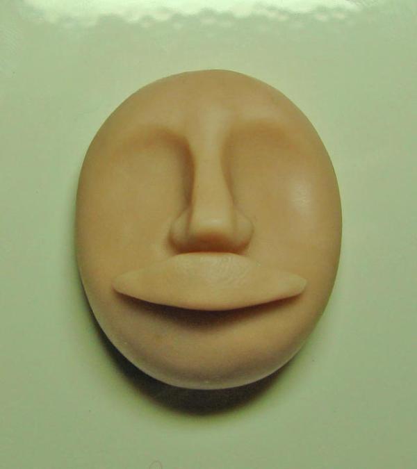 Cómo moldear una cara con arcilla - Paso 6