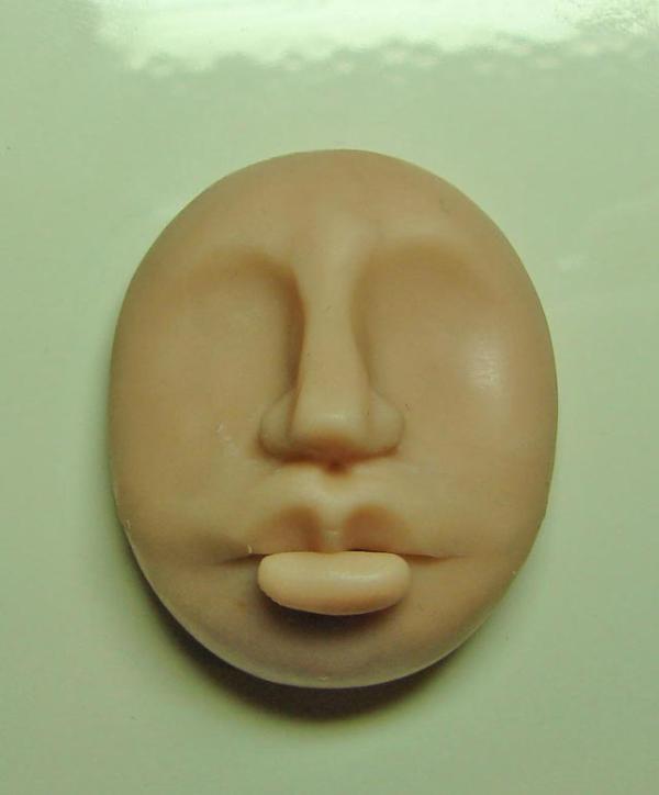 Cómo moldear una cara con arcilla - Paso 8