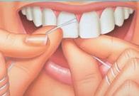 Cómo usar el hilo dental correctamente - Paso 3