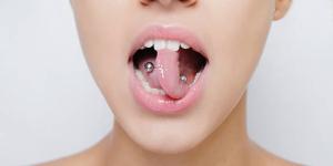 Cómo curar un piercing infectado en la lengua