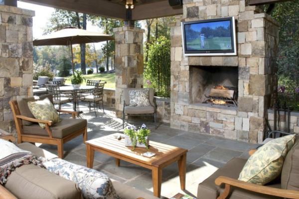 Cómo decorar un salón con chimenea - Una chimenea en la terraza, el lujo para algunos