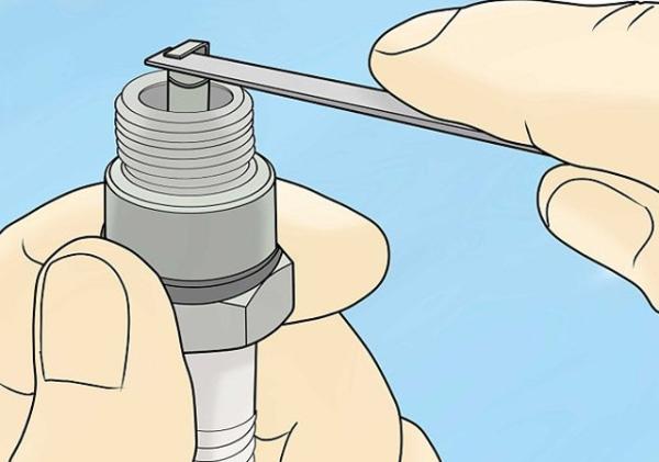 Cómo reparar una bujía - Paso 4